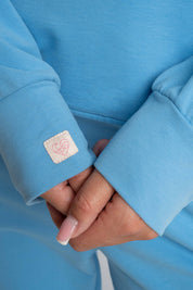 BLUZA Z KAPTUREM NIEBIESKA - AURENA