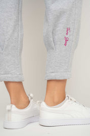 DRESOWE SPODNIE DAMSKIE Z KIESZENIAMI I ZWĘŻANYMI NOGAWKAMI W KOLORZE SZAREGO MELANŻU - SUZIE