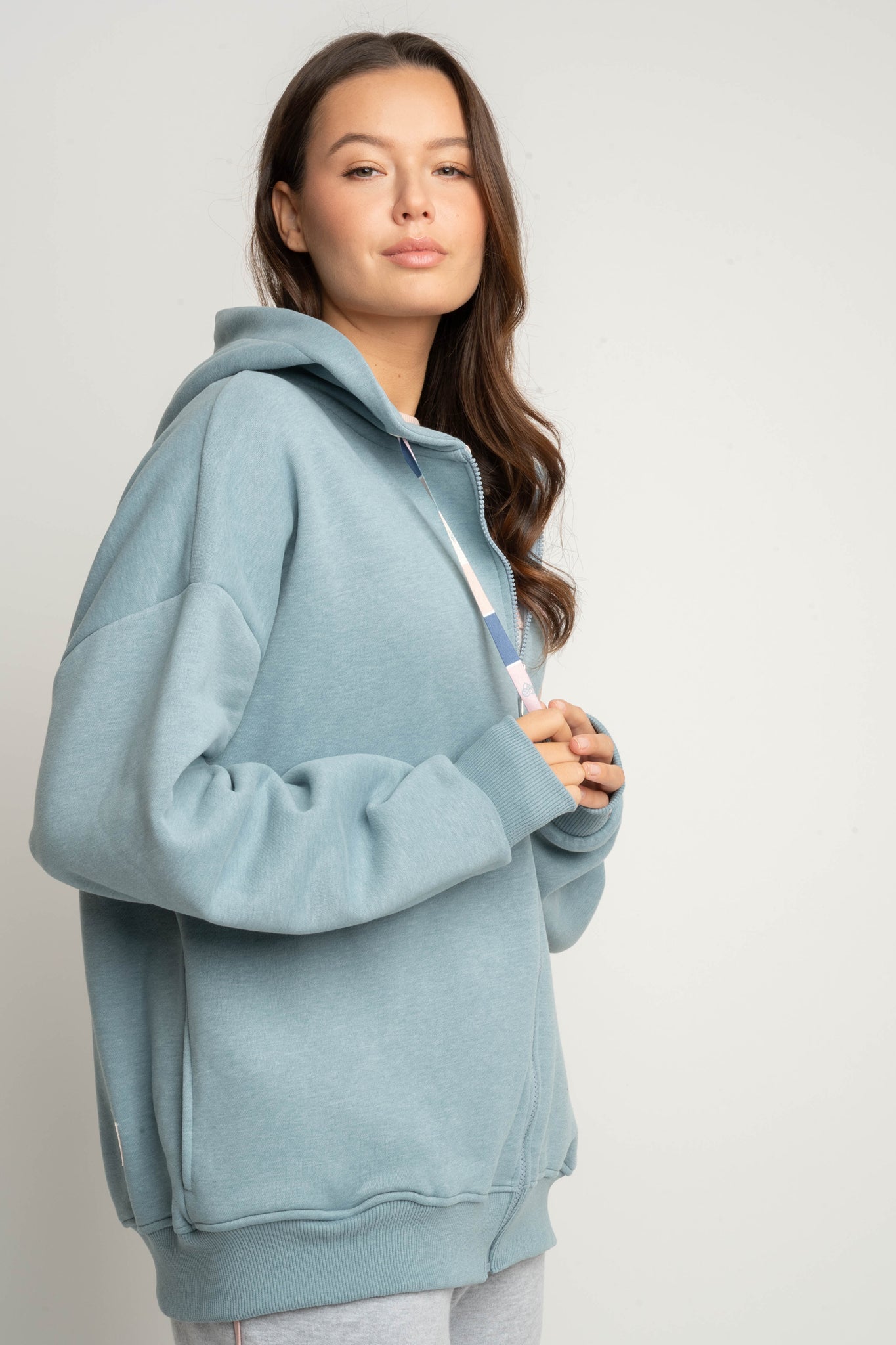 BLUZA Z KAPTUREM ROZPINANA TURKUSOWA - FLEUR